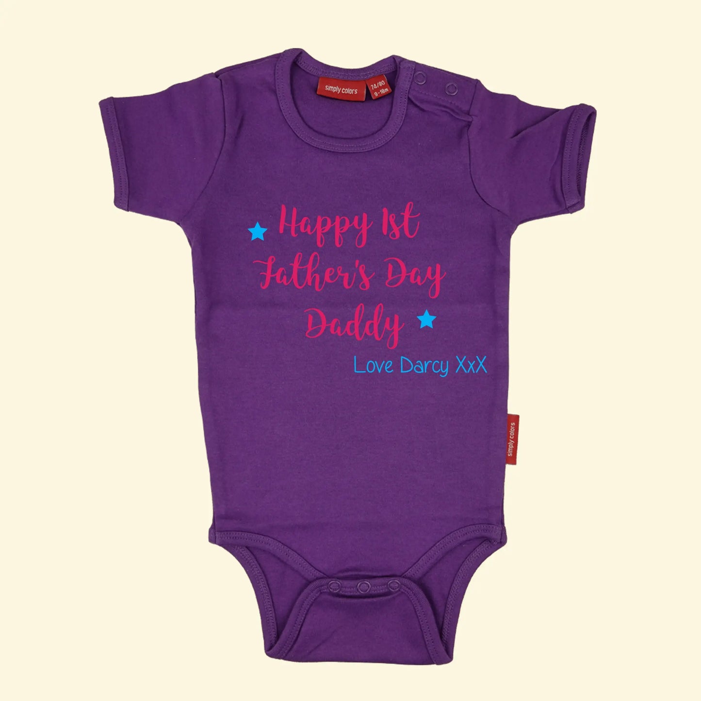 Purple short sleeve bodysuit with three lines of text - Happy 1st Father's Day Daddy printed in fuchsia pink and two stars and Love Darcy XxX printed in blue
