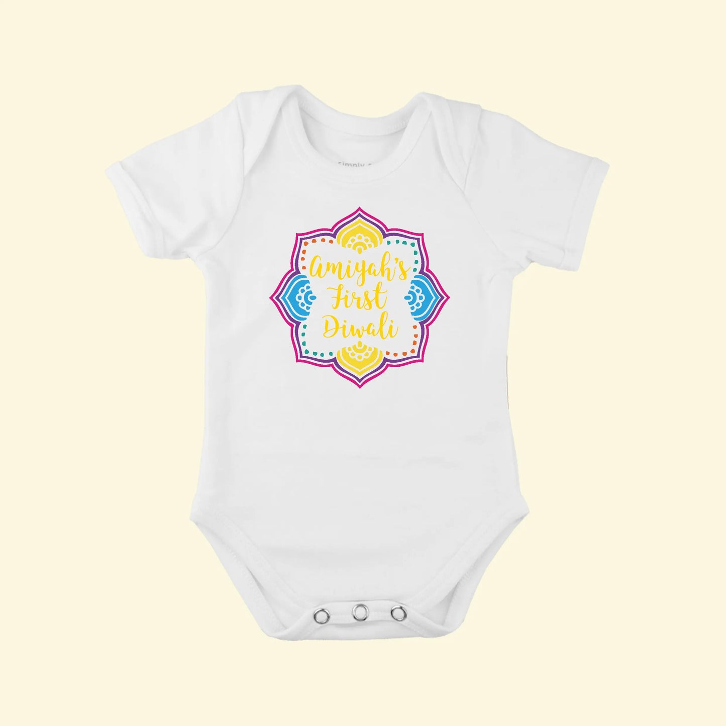 White babygrow with a colourful Diwali design with Amiyah's First Diwali printed in the centre.