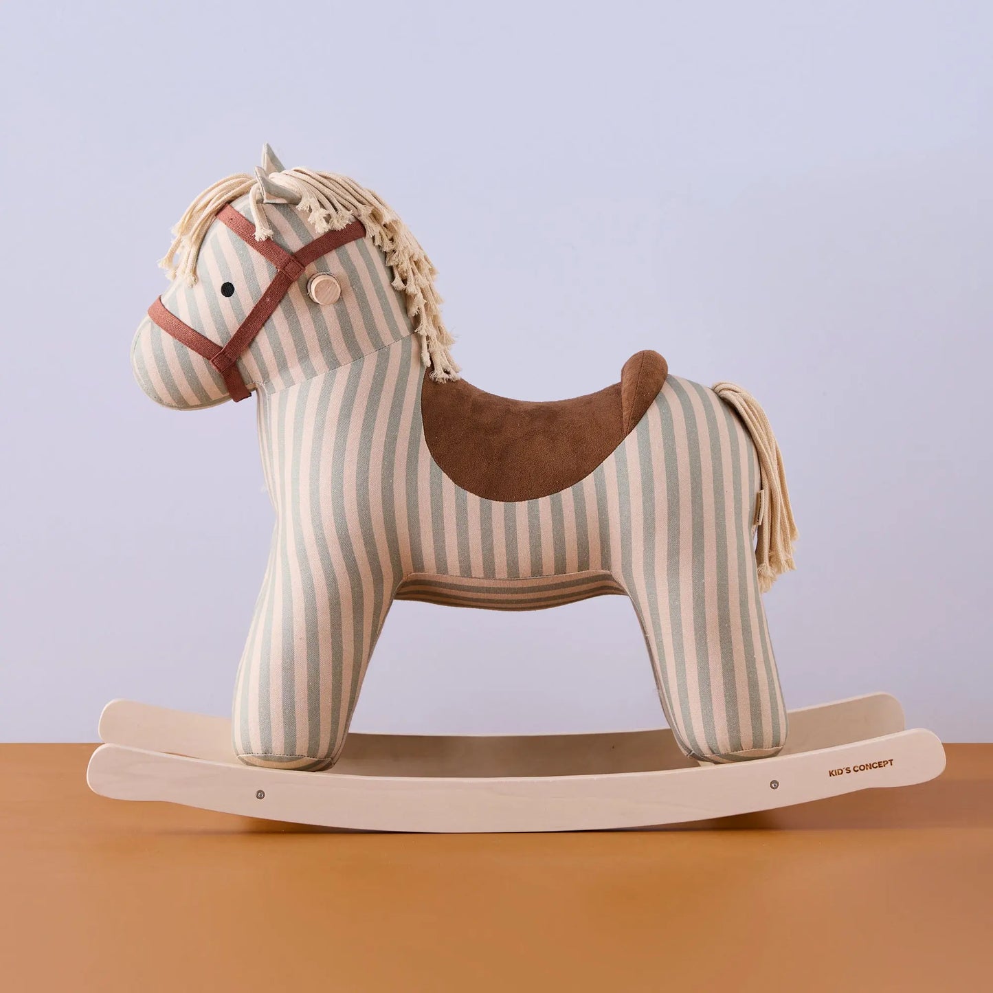 Full side view of rocking horse sam toy