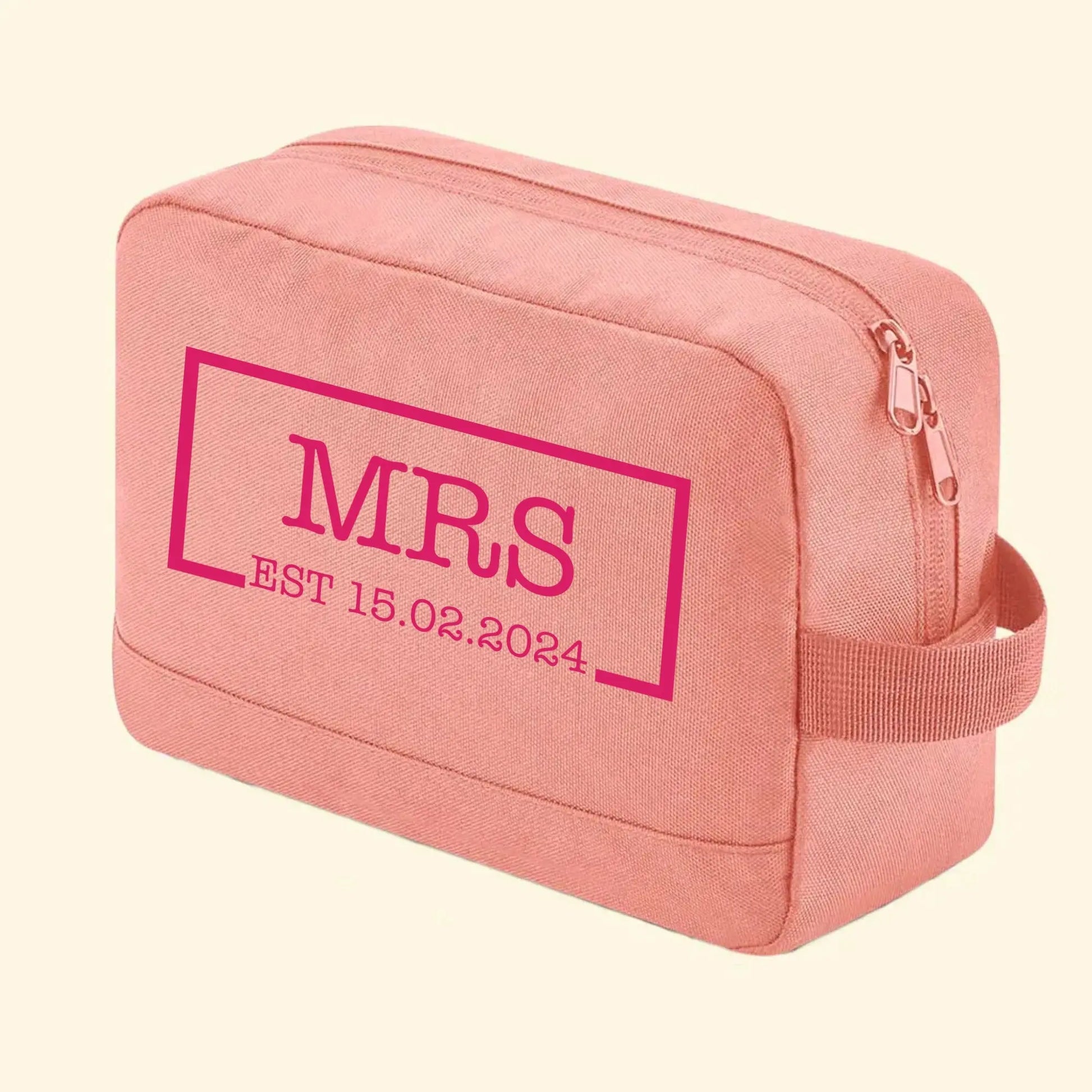 Pink wash back with Mrs in the middle of a rectangle with a gap at the bottom. The date EST 15.02.2024 is in the gap, printed in lockers American type in fuchsia pink