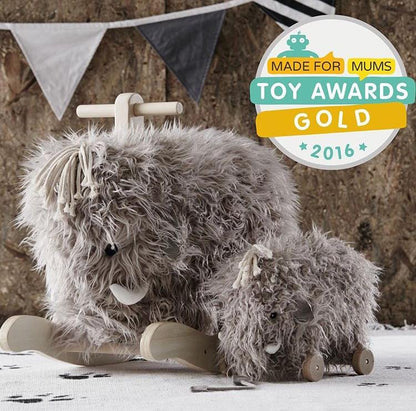 Rocking mammoth toy and a mammoth pull along toy side by side. The made for Mums Toy Award Gold 2016 badge in top right of image