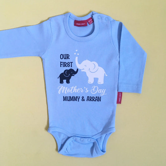 Light Blue long sleeve bodysuit with design of mummy and baby elephant in two print colours - text reads our first, Mother's Day, Mummy & Arran