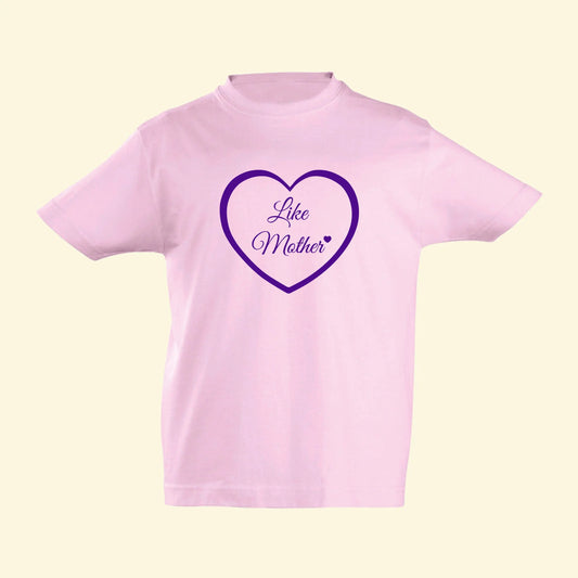 Kids light pink top with Like Mother printed inside a heart in purple.