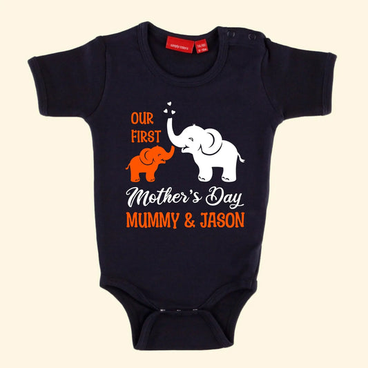 Navy short sleeve bodysuit with design of mummy and baby elephant in two print colours - text reads our first, Mother's Day, Mummy & Jason