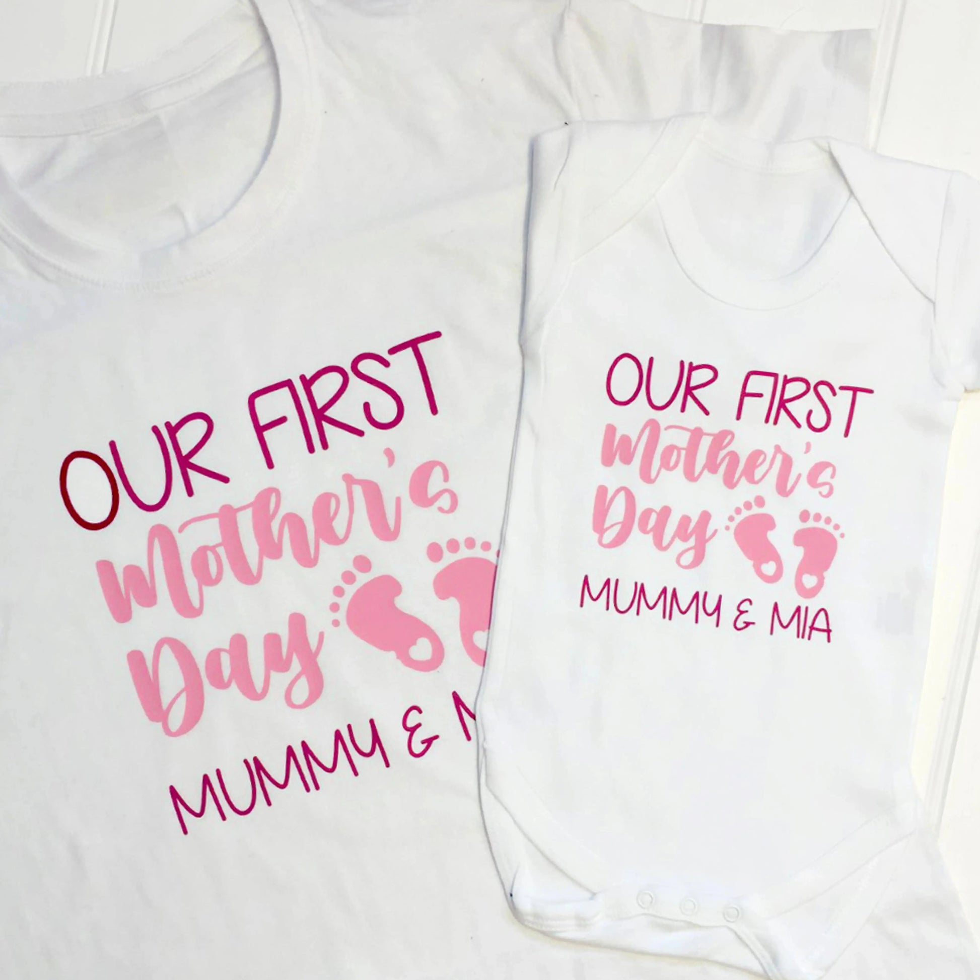 Our first mother's day set both items are white and read Mummy & Mia printed in two print colours fuchsia pink and light pink.
