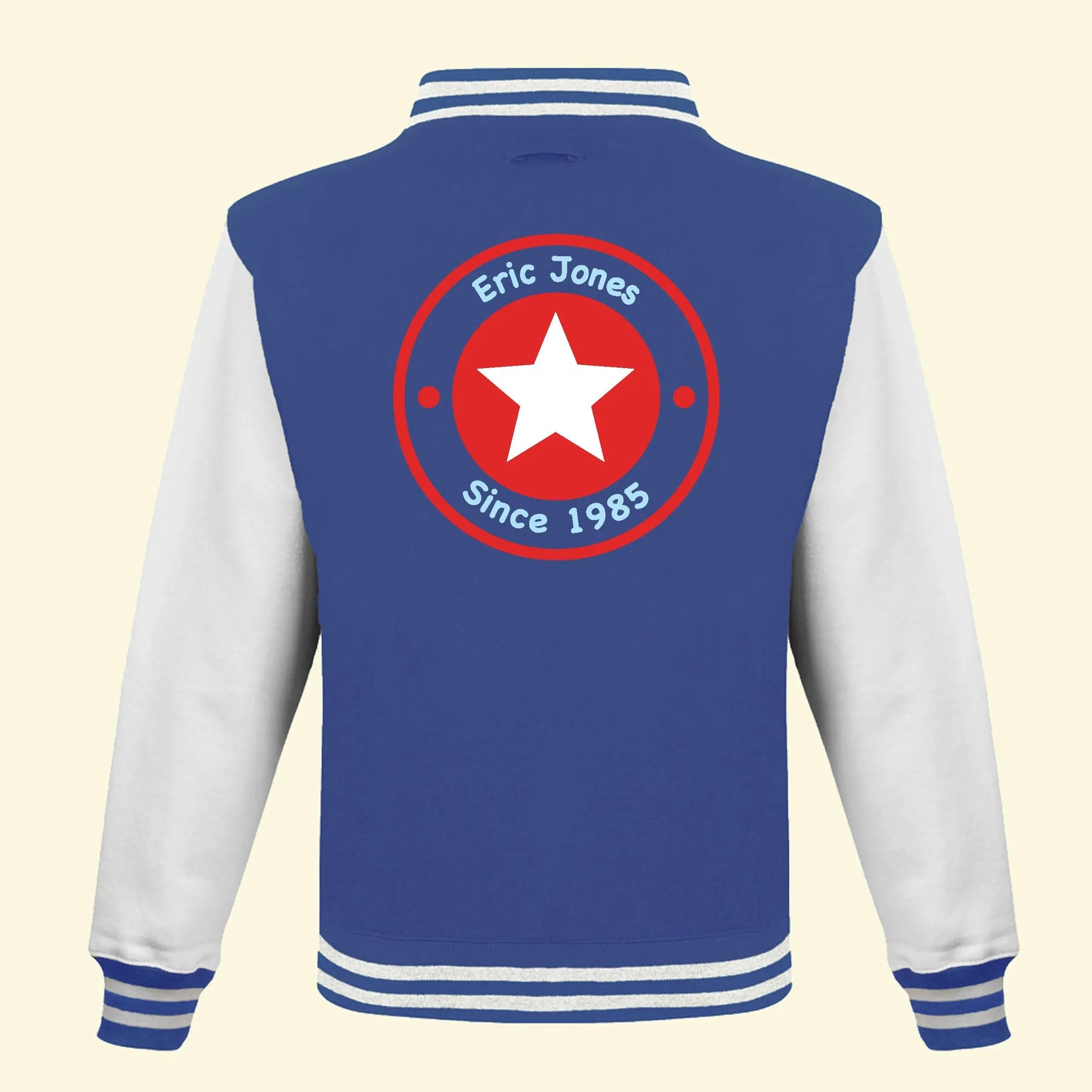Blue Varsity Jacket, with White sleeves. Printed with a circle and star on the back with the name Eric Jones and Since 1985