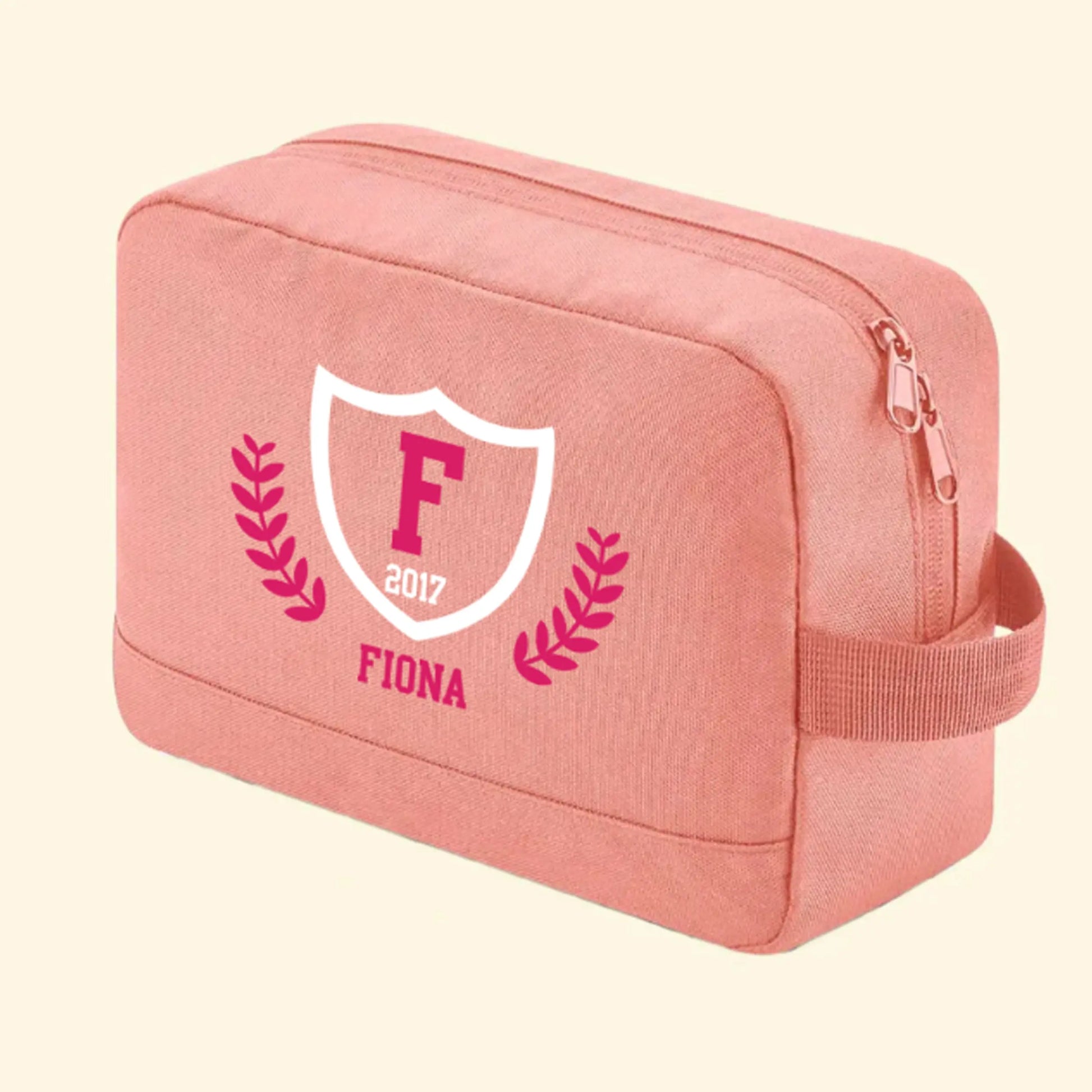 Pink wash bag with a college logo design on the front with the name Fiona, F and 2017, in the colours pink and white