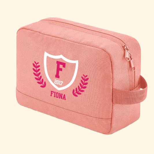 Pink wash bag with a college logo design on the front with the name Fiona, F and 2017, in the colours pink and white