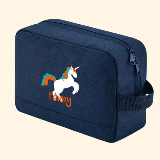 Navy wash bag with a colourful unicorn and the name Penny printed underneath
