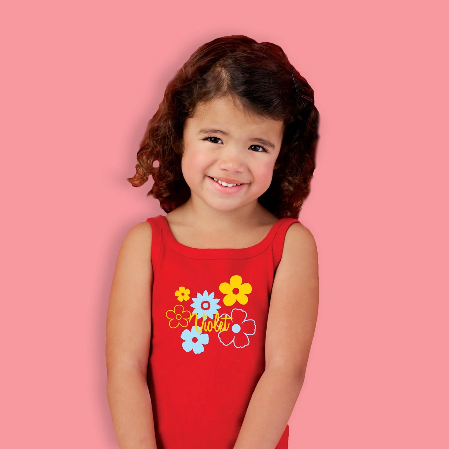 Red dress with a flower design printed in two colours yellow and mint with the name Violet printed in the center. 