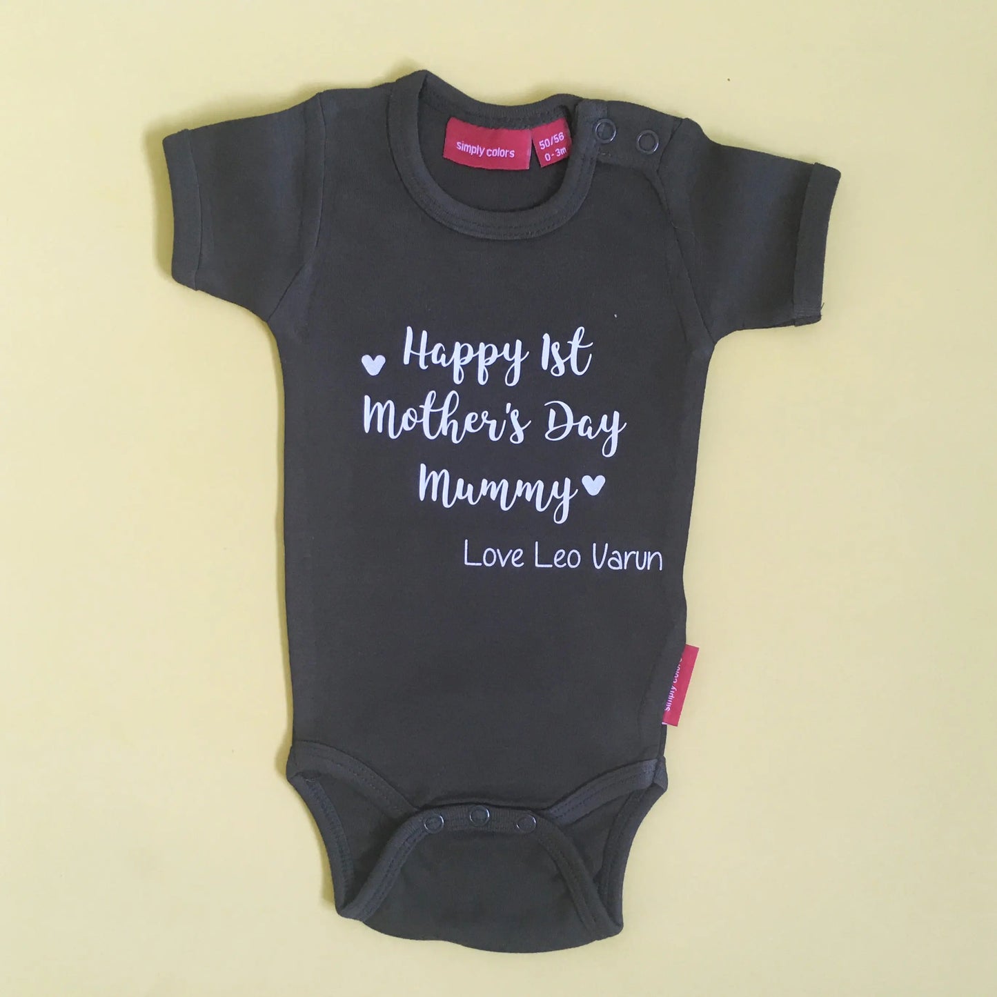 Army green short bodysuit with design Happy 1st Mother's Day mummy printed over three lines in white.