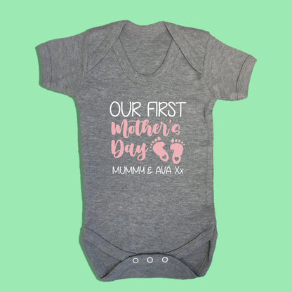 Grey short sleeve envelope with Our first mother's day Mummy & Ava printed in two print colours white and light pink