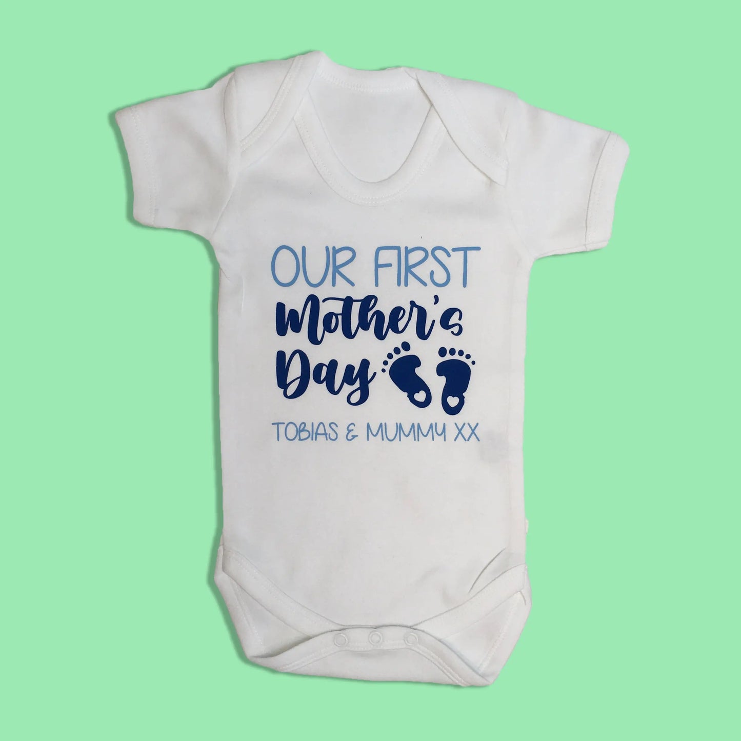 White short sleeve envelope with Our first mother's day Tobias & Mummy printed in two print colours light blue and royal blue