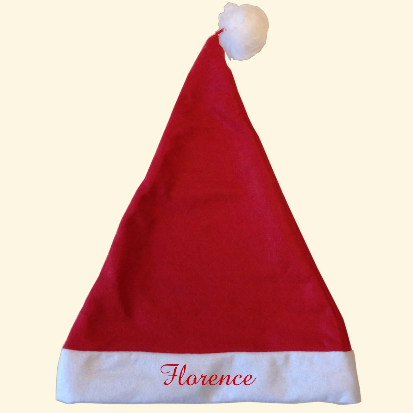 Christmas hat printed with the name Florence in Amazone font, in red vinyl.