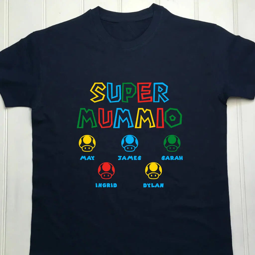 Navy t shirt with a super Mario style gamer design printed on the front. The text reads Super Mummio in vibrant prime colours with 5 mushrooms underneath in different colours with names underneath to represent each of the mother's children.