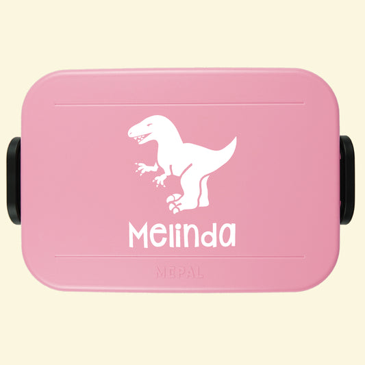 Nordic pink lunch box with a dinosaur and the name Melinda printed on the lid,