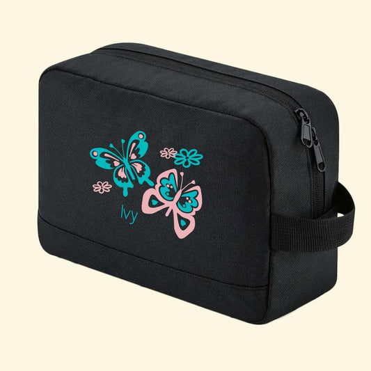 Black wash bag with a lovely butterfly design and the name Ivy