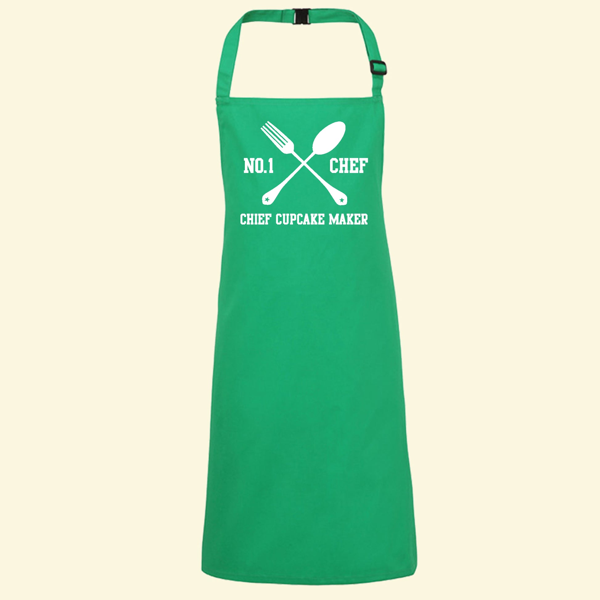 Green apron with a spoon and fork design and the text No.1 Chef and Chief Cupcake maker underneath, which can be changed to your own text