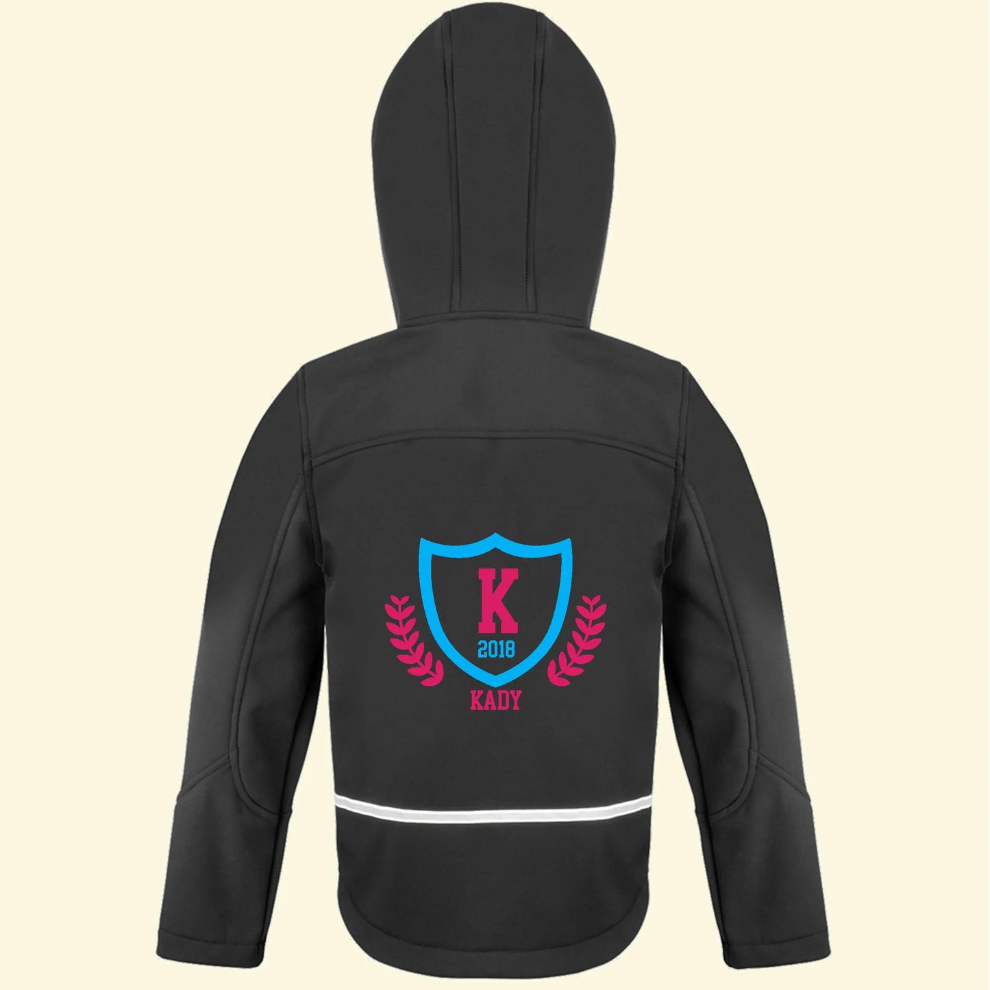 Black softshell jacket with a college logo design on the back and the name Kady, initial K and the year 2018 printed in blue and pink colours