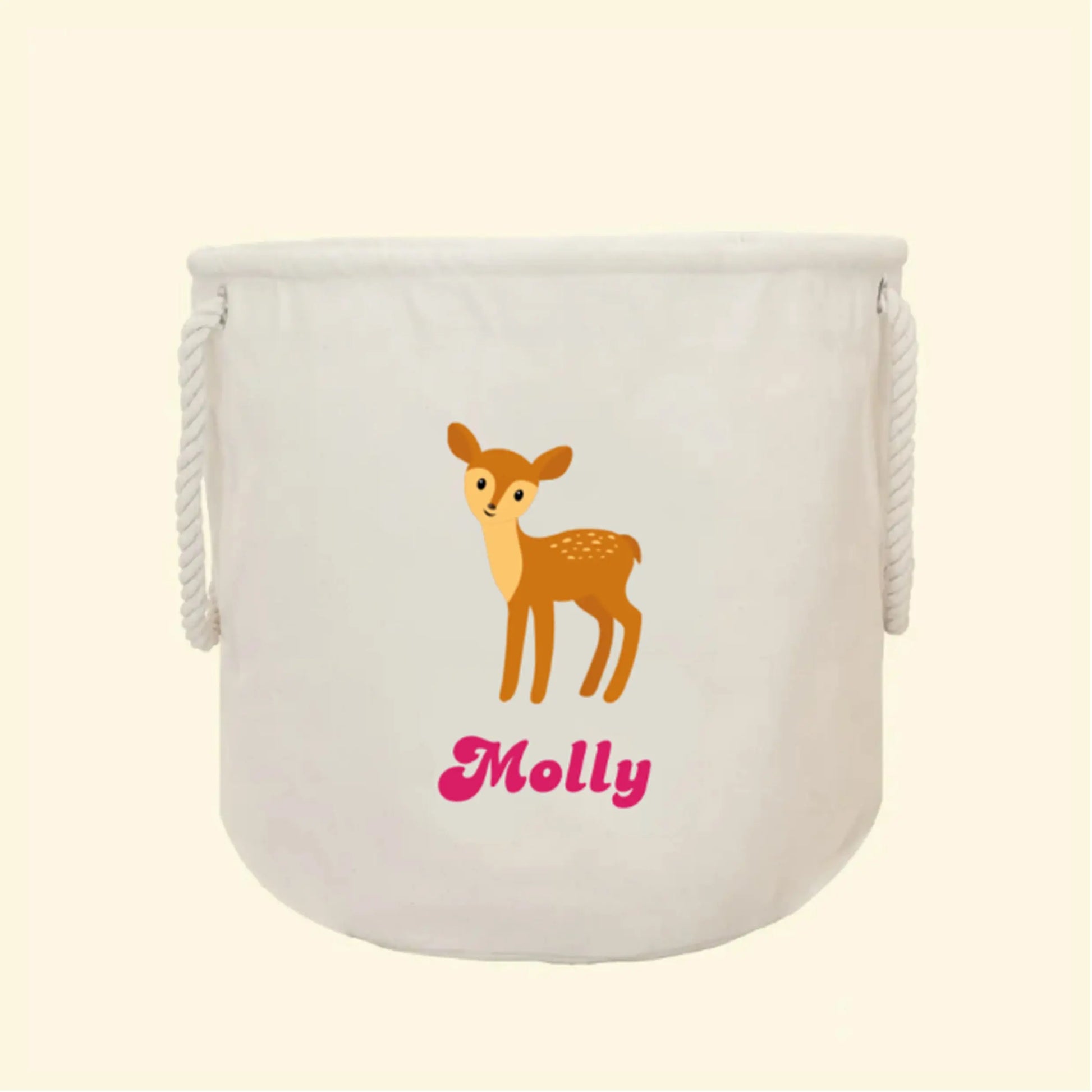 Natural cream cotton canvas storage trug with rope handles on the side. On the front is a baby deer and the name Molly