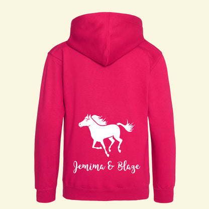 Bright pink kids hoodie with an image of a running horse and text printed in white on the back.