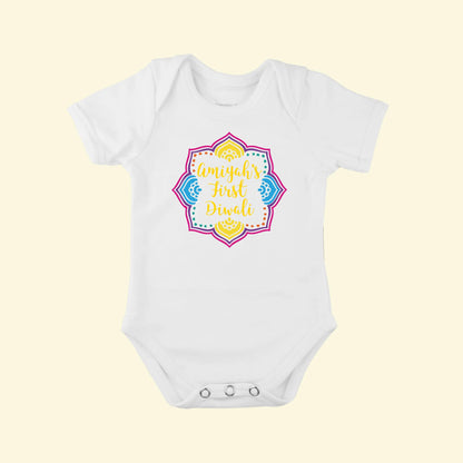 White babygrow with a colourful Diwali design with Amiyah's First Diwali printed in the centre.