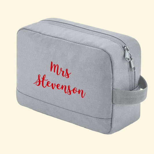 Grey wash bag with Mrs Stevenson printed on one side