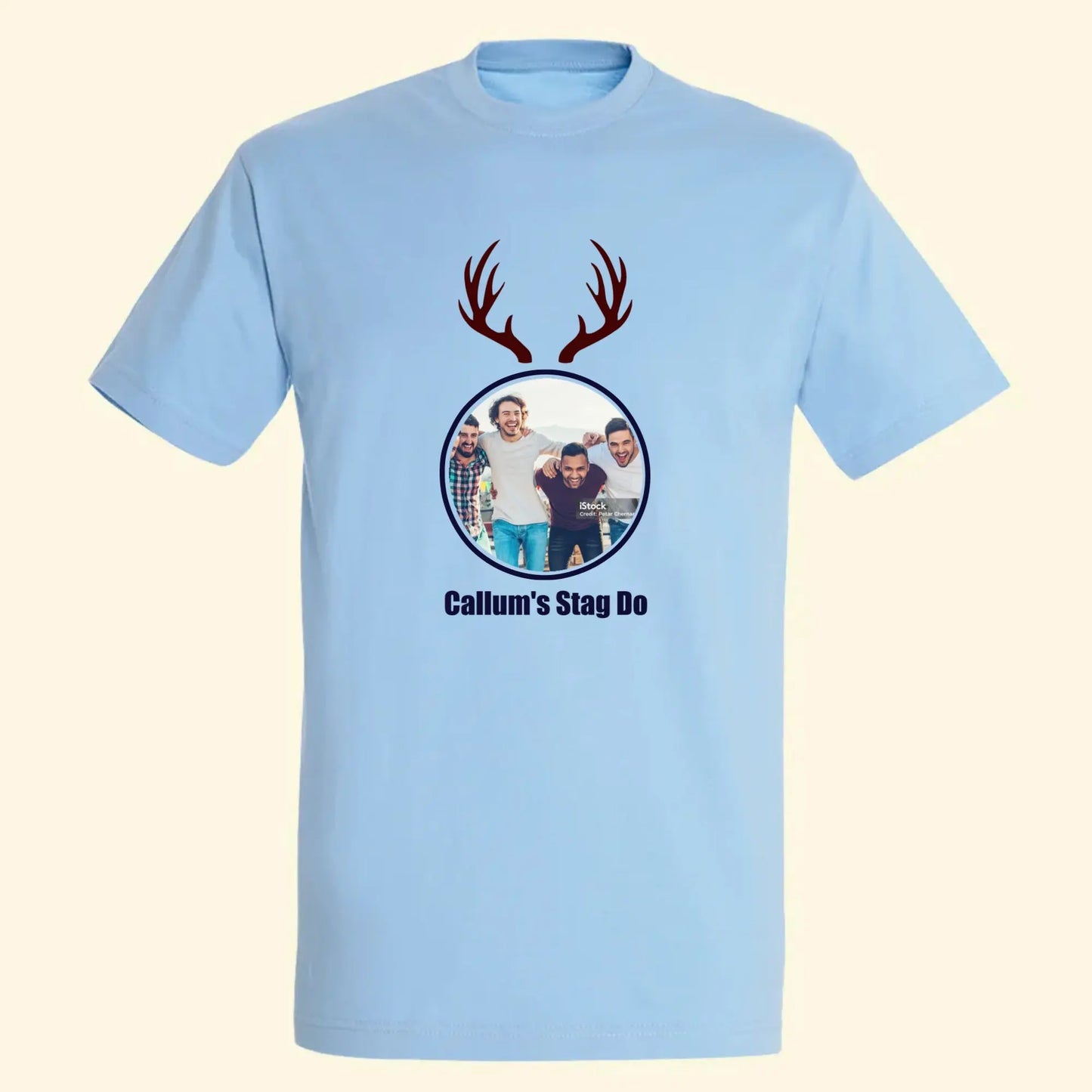 Light blue t shirt with your own photo in a circle with stag antlers above and Callum's stag do written underneath.