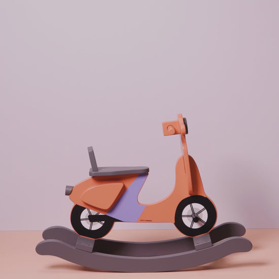 Short video of the rocking scooter, showing all sides and features, The scooter is rust and lilac colours.