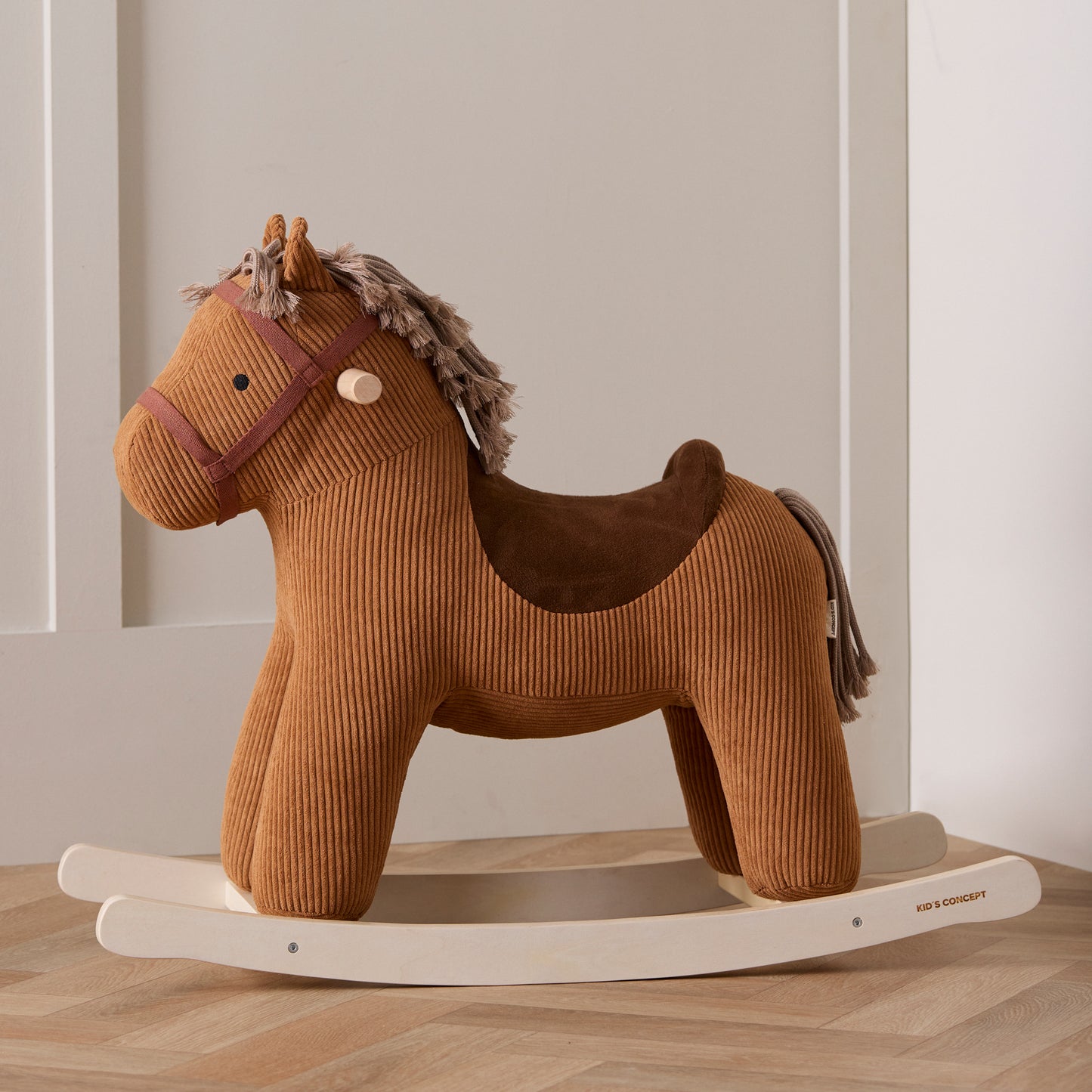 Side view of rocking horse vera toy