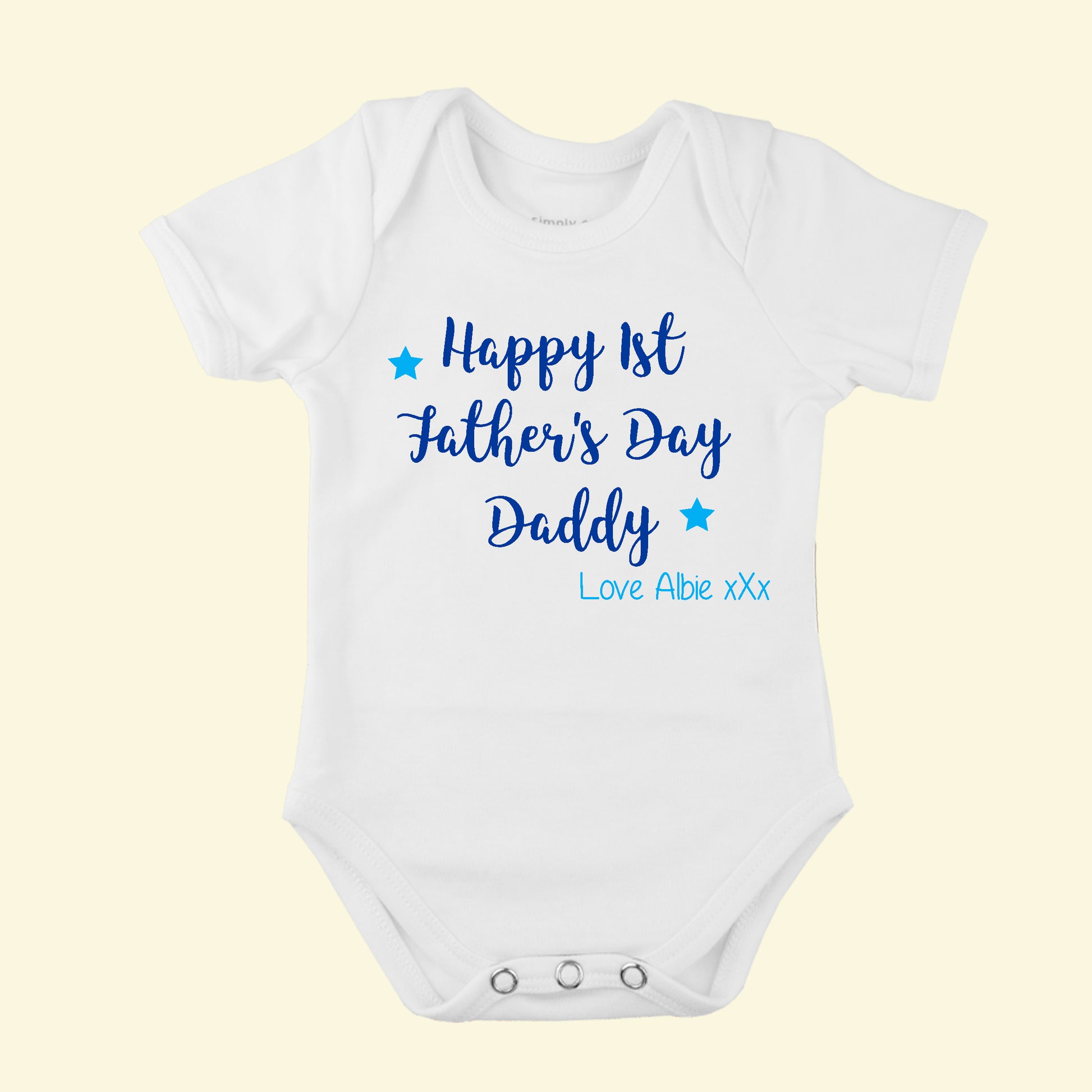 White babygrow with Happy 1st Father's day Daddy Love Albie on the front with stars in Blue and Royal Blue