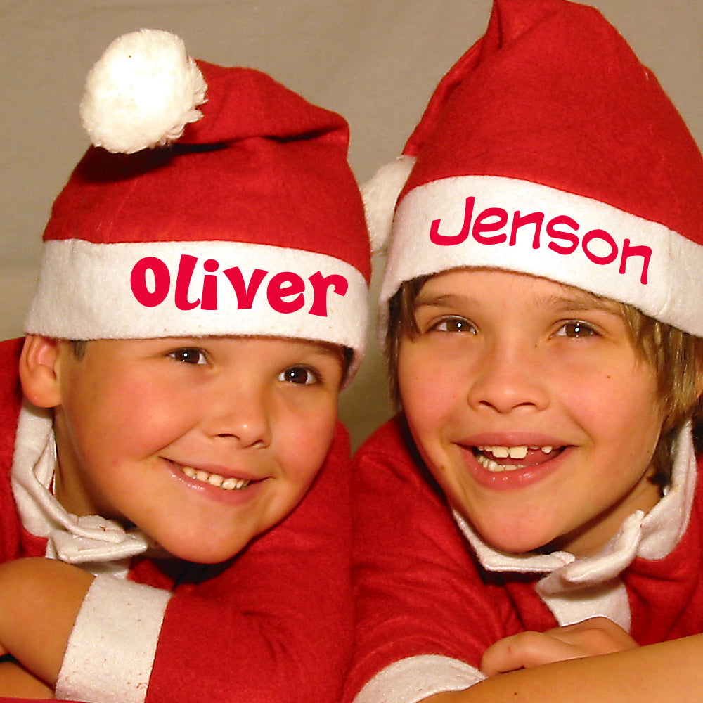 Two boys wearing Christmas hats. First name Oliver printed in hip hop font and the second name Jenson printed in editable pet font. Both printed in red.